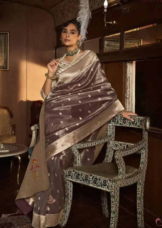 Unique fusion saree with pure tissue silk body and paithani border.